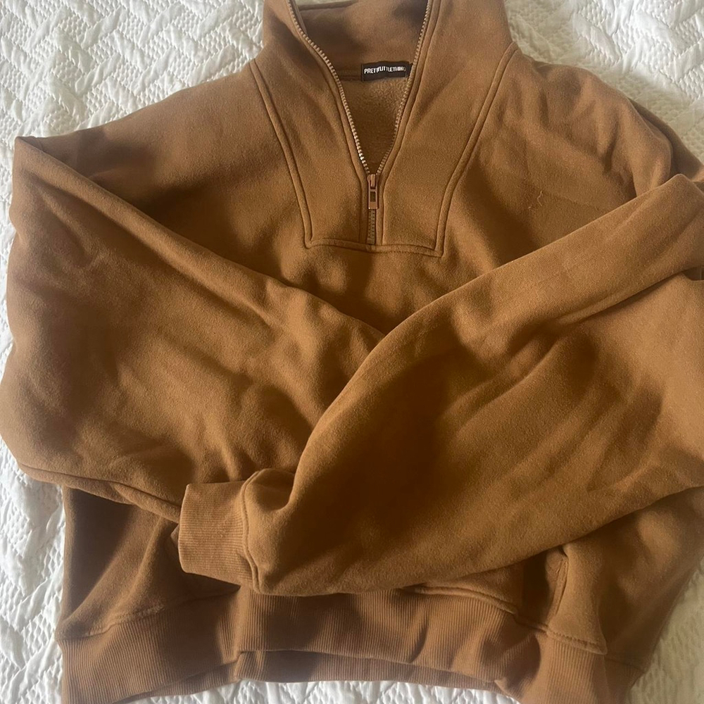 Brown and tan quarter zip sweatshirt